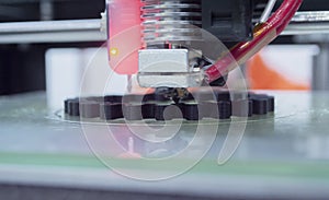 3d printer printing model close-up. Process of printing a model on a 3D printer