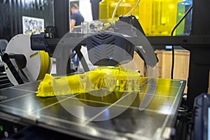 3D printer printing object close-up. Process creating three-dimensional model