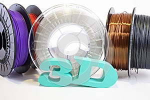 3D printing filament reels with text `3d` on white background