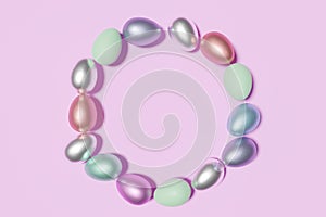 3d render of easter egg wreath on a pink backgroun