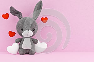 3d render illustration of cute rabbit toy model on pink background