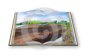 3D render of an opened photo book with an Irish peat bog landscape - (Ireland - Europe)