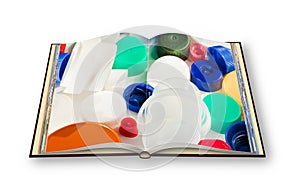 3D render of an opened photo book isolated on white background with colored plastic caps