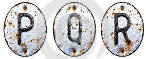 3D render set of capital letters P, Q, R made of forged metal on the background fragment of a metal surface with cracked