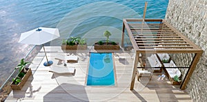 3d render Top view of luxury patio with lake view and swimming pool