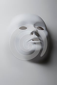 3D render of a white surface in the shape of a human mask