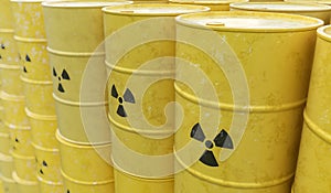 3D rendered illustration of many radioactive barrels. Nuclear waste dumping concept