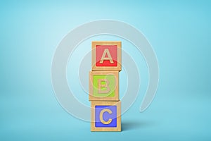 3d rendering of alphabet toy blocks on blue background.