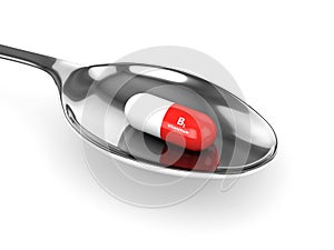 3d rendering of B2 vitamin pill on spoon