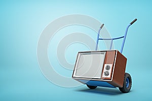 3d rendering of blue hand truck standing in half-turn with brown retro TV set on it on light-blue background with copy