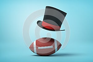 3d rendering of a brown gridiron football and a black tophat floating in air above the ball on light blue background.