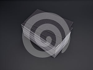 3D rendering of business card on a black background.