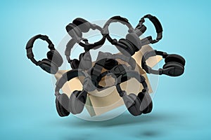 3d rendering of cardboard box in air full of black headphones which are flying out and floating outside on blue