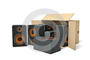 3d rendering of cardboard box lying sidelong with black audio speakers inside and three outside.