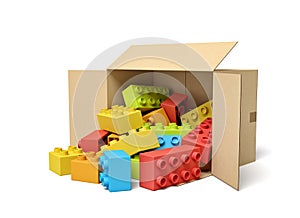 3d rendering of cardboard box lying sidelong full of colorful toy bricks.