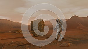 3D rendering. Colony on Mars. Two Astronauts Wearing Space Suit Walking On The Surface Of Mars