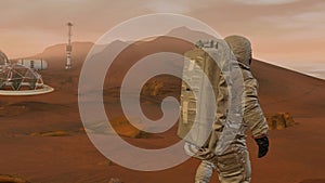 3D rendering. Colony on Mars. Two Astronauts Wearing Space Suit Walking On The Surface Of Mars