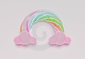 3D rendering of colorful pastel clouds and rainbow with empty space for kids or baby products. Sweet candy background