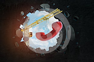 3d rendering of construction crane and red retro telephone receiver seen through black wall hole