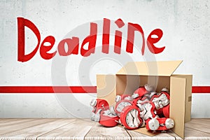 3d rendering of damaged red alarm clocks in a cardboard box with `Deadline` sign on white wooden floor background