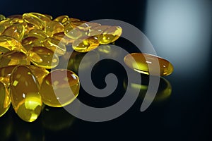 3D Rendering Fish Oil. Omega 3, omega 6, omega 9, vitamin D. Pile of capsules Omega 3 on black background, Cod Liver