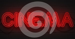 3D rendering flickering blinking red neon sign on dark brick background, cinema movie film entertainment sign