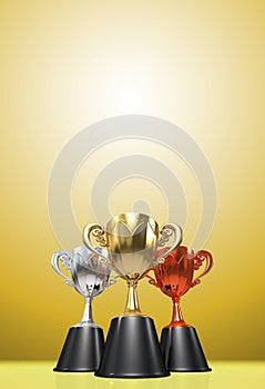 3D rendering gold, silver and bronze awards winners cup sitting