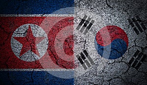3D Rendering of Grunge Dual Flags of North Korea and South Korea on Concrete Wall