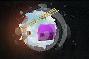 3d rendering of hoisting crane carrying purple toy block and breaking wall leaving hole with blue sky seen through.