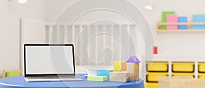 3D rendering, laptop with mock-up screen on round table with playthings in kid bedroom with bed and shelf