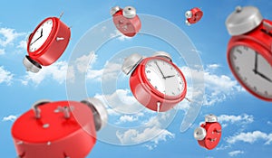 3d rendering of a many red round retro alarm clocks falling down on the background of a blue sky with white clouds.