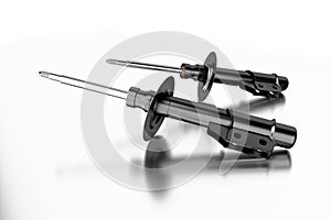 3D rendering. Passenger car Shock Absorber, new auto parts, spare parts.