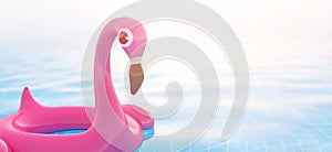 3d rendering of pink flamingo float in swimming pool with copy space for your text for summer holiday concept