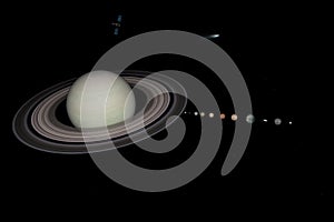 3d rendering of the planet Saturn and moons closeup with stars on background