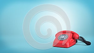 3d rendering of a red retro rotary phone with a black cord stands unused on blue background.