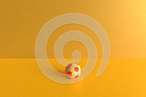 3d rendering of a red and yellow ball on a yellow background. Worl cup resources