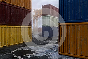 3D rendering of shipping containers stacked up in a docklands yard