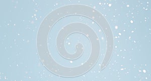 3d rendering of snowfall against blank pale blue background. Seasonal winter theme illustration, falling snow