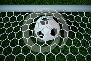 3d rendering soccer ball in goal. Soccer ball in net with spotlight and stadium light background, Success concept