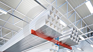 3d rendering of steel pipe product on shelf inside warehouse