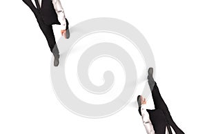 3d rendering. two business partner men walking on different way on white background.