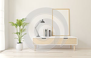 3d rendering white Poster frame mockup on the sideboard ,white loft wall ,wooden floor.