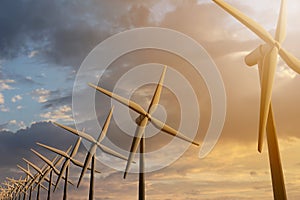 3D rendering of windmills producing engergy in the evening