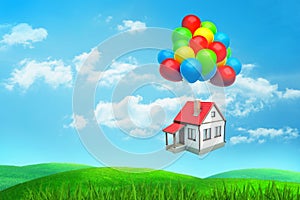 3d rendering a write red-roofed house flies hanging on many colored balloons over a green field.