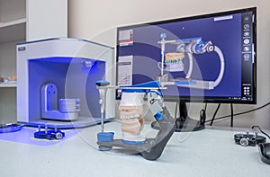 3D scanner and PC in the process of creating dentures