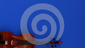 3d visualization of a violin on a blue table