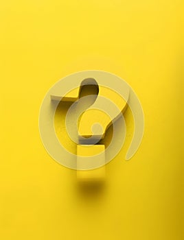 3d yellow question mark on a yellow background