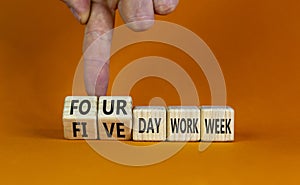 4 or 5 day work week symbol. Businessman turns cubes, changes words `five day work week` to `four day work week`. Beautiful or