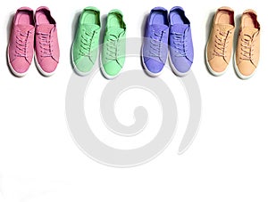 4 colorful sneaker shoes on white background