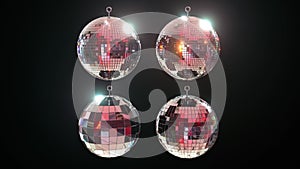 4 different shiny disco mirror balls on black background. Retro party night club animation 3d